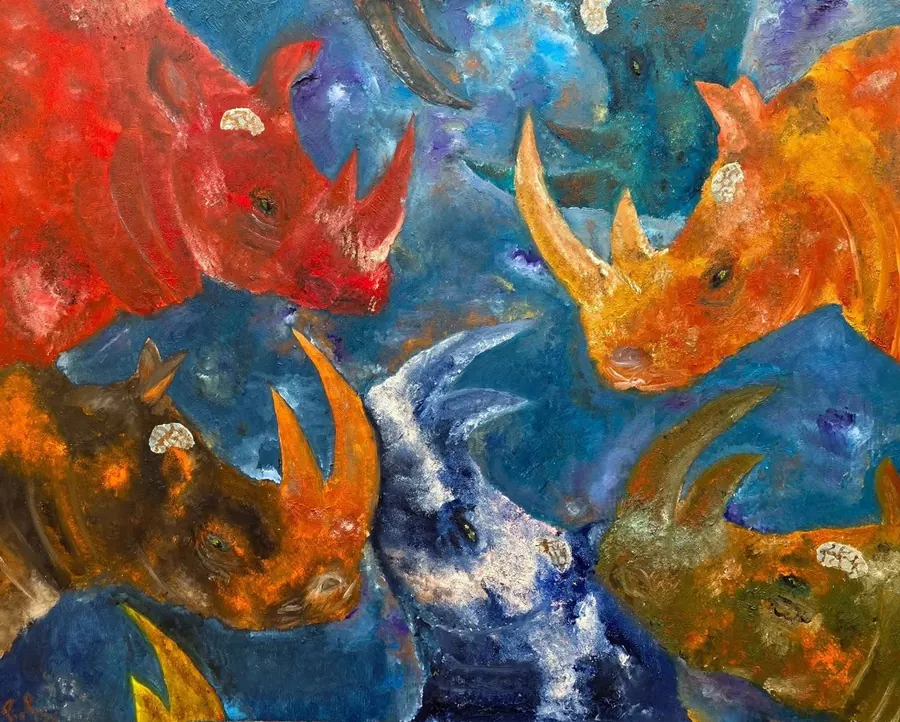Rinoceronti rossi, arancioni e blu con il cervello a vista, su fondo blu